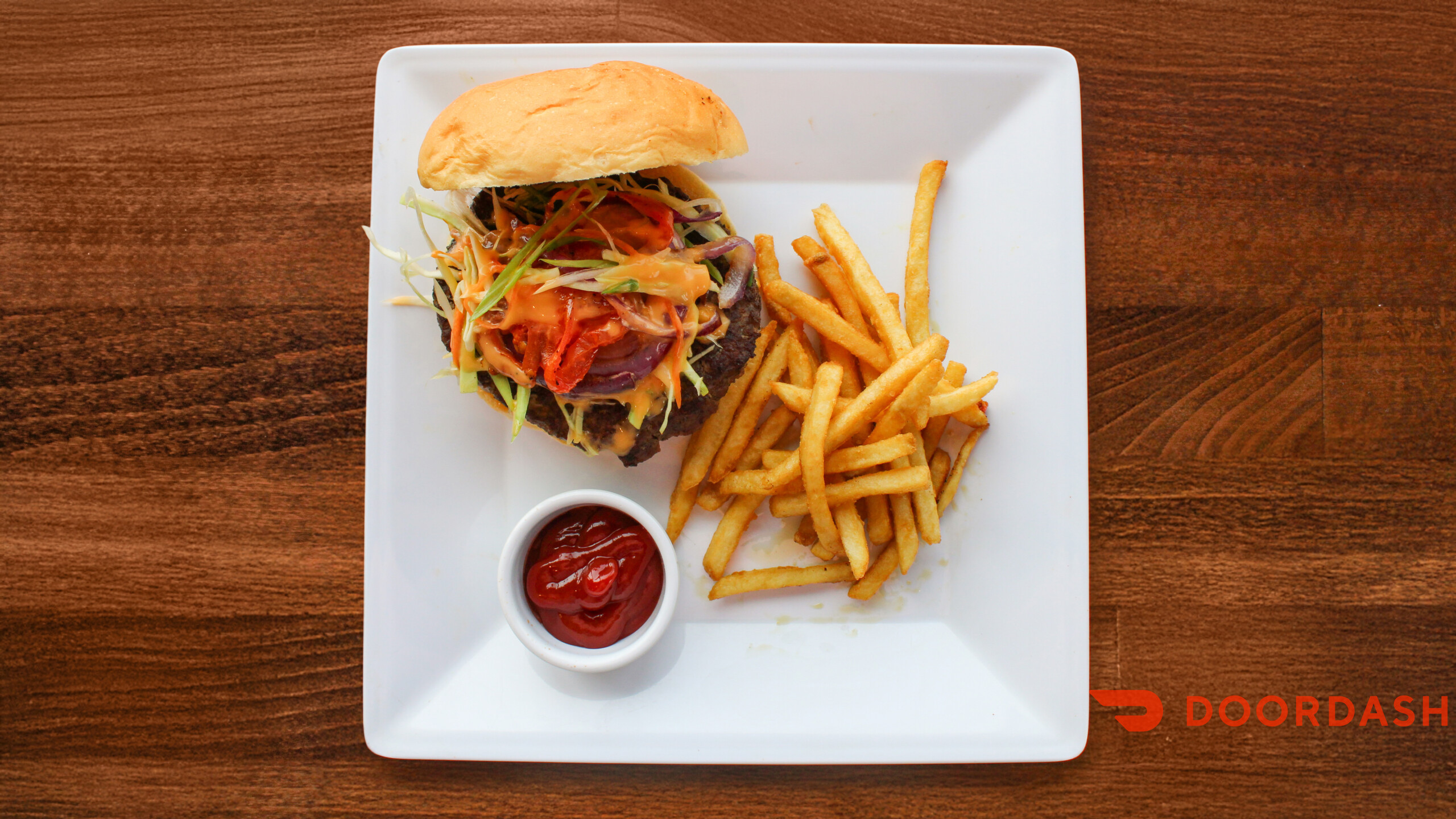 Loaded burger with slaw and fries